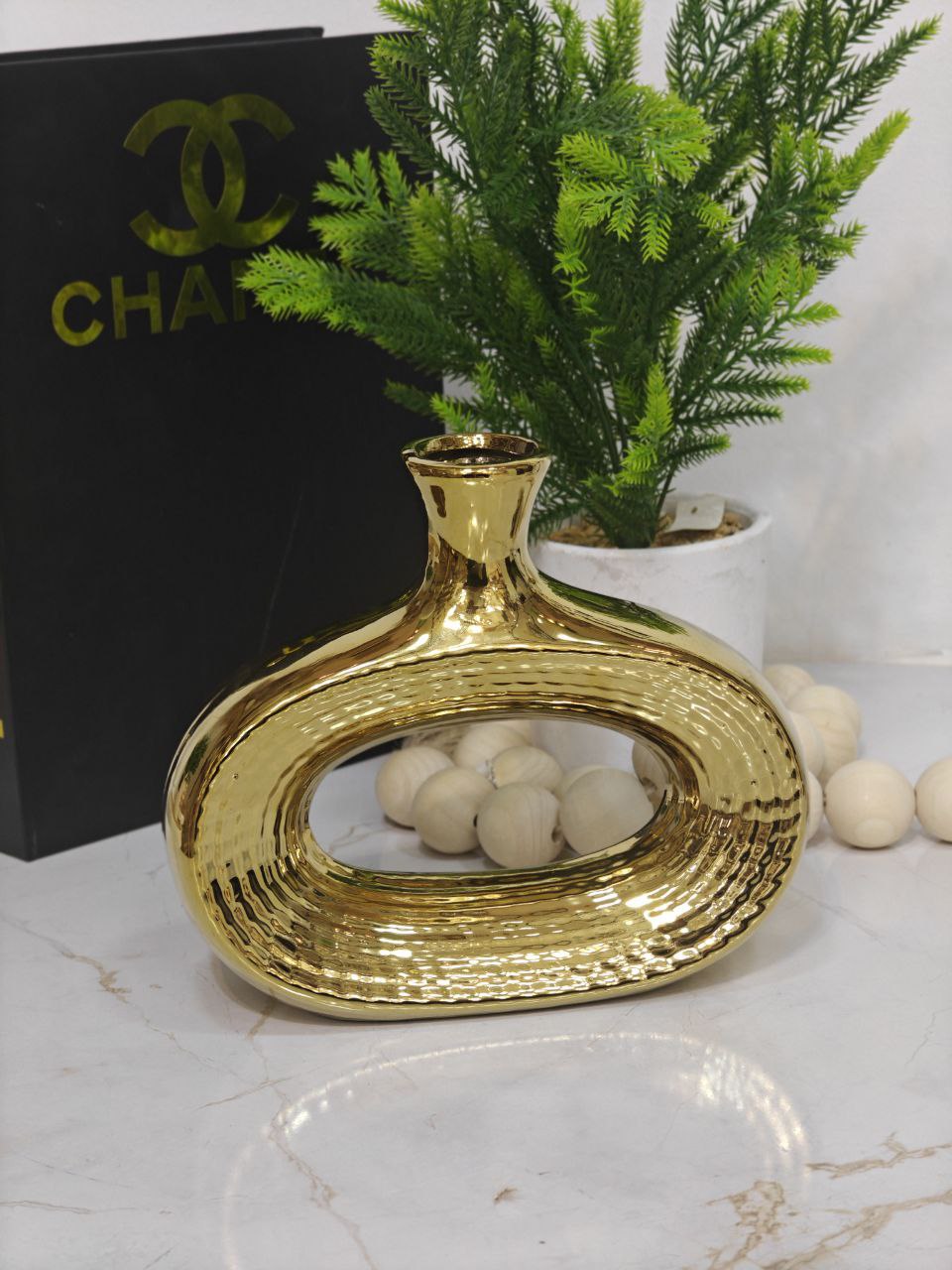 Vase doré donut