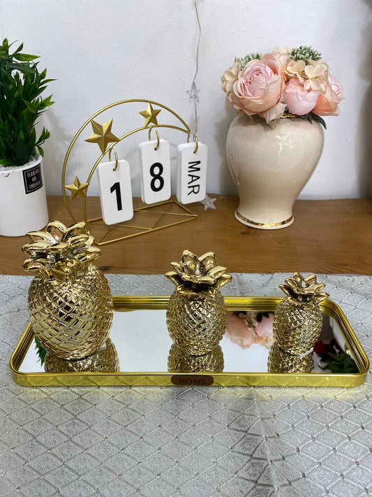 Ananas décoratif doré
