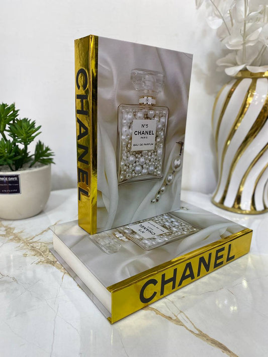 Faux livre chanel doré nv