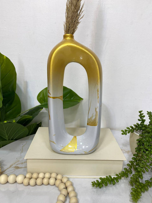 Vase marbré doré