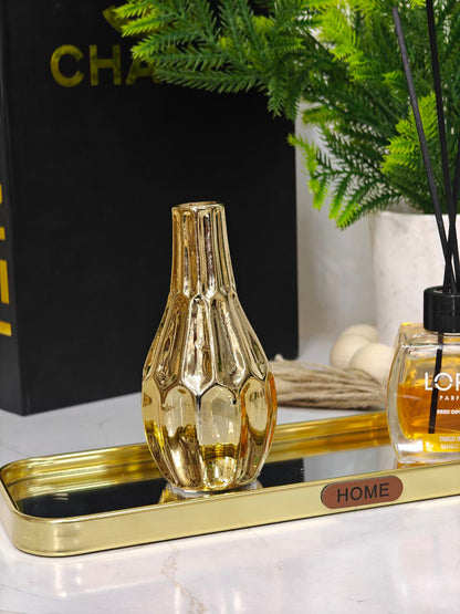 Mini vase doré ( vide )