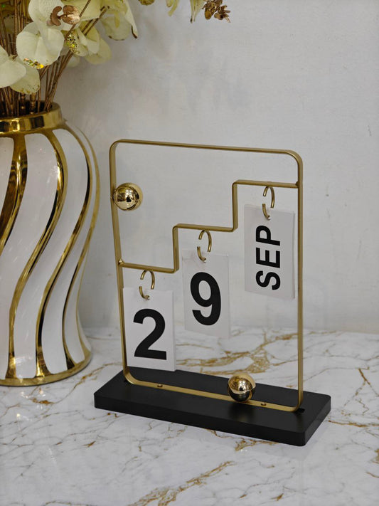 Calendrier noir et doré nv